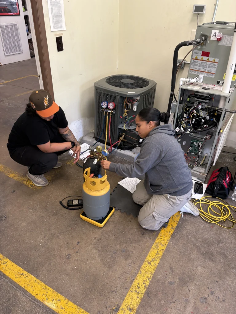 Hands-on HVAC training session showing industry growth in 2025.